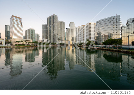 City of Miami, Florida skyline reflected in Biscayne Bay at sunrise. 110301185