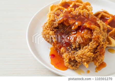 fried chicken with waffle and spicy sauce 110301270