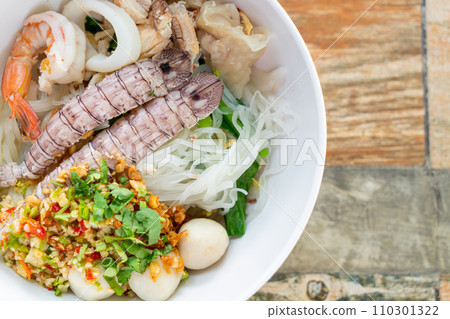 spicy seafood noodles bowl in Thai style 110301322