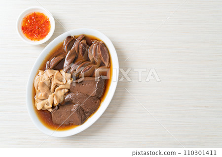 stewed duck offal in brown soup stewed duck offal in brown soup 110301411