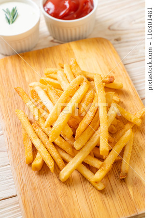 French fries with sour cream and ketchup 110301481
