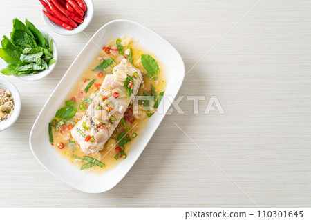 steamed sea bass fish with herbs steamed sea bass fish with herbs 110301645