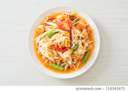 Som Tum - Thai Spicy green papaya salad with salty eggs Som Tum - Thai Spicy green papaya salad with salty eggs 110301673