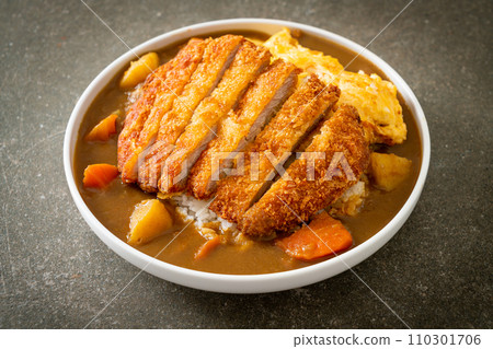 curry rice with fried pork cutlet and creamy omelet curry rice with fried pork cutlet and creamy omelet 110301706