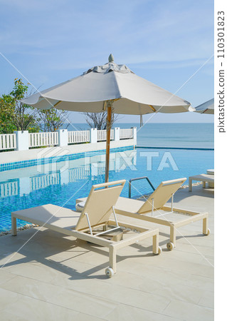 bed pool around swimming pool with sea background bed pool around swimming pool with sea background 110301823