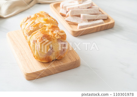 taro toast bread on wood board 110301978
