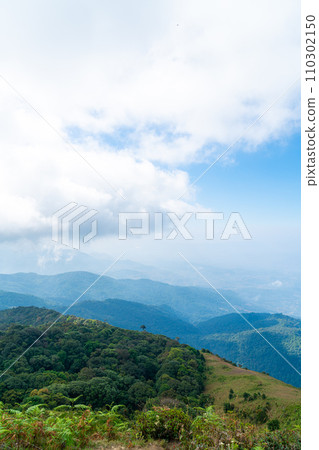 beautiful mountain layer with clouds and blue sky 110302150