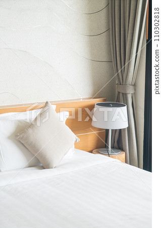 beautiful and comfortable pillows decoration on bed 110302818