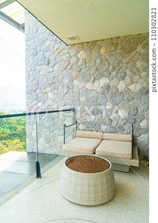 outdoor patio sofa on balcony 110302821