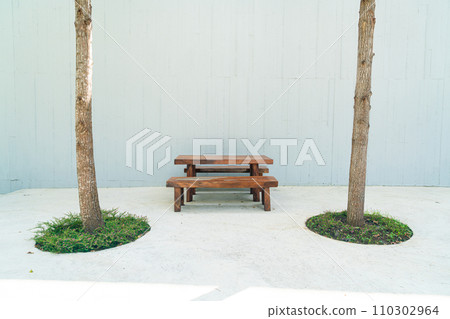 empty wood outdoor patio table and chair set 110302964
