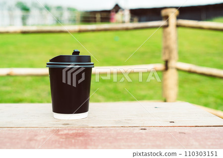 coffee cup on wood table with Mountain hill View background coffee cup on wood table with Mountain hill View background 110303151