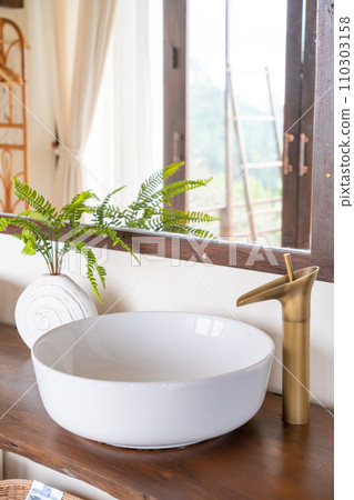 close up brass tap on bath room close up brass tap on bath room 110303158