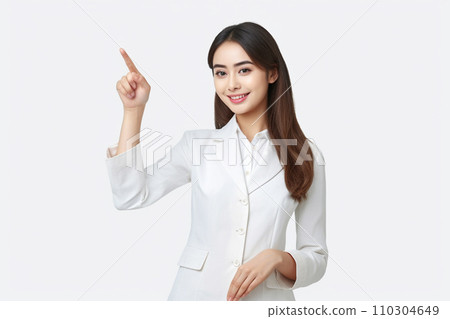 A woman smiling with a finger 110304649