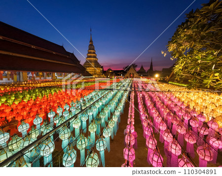 Paper lanterns in the Yee Peng Festival decorate around Lumphun downtown, Thailand. Paper lanterns in the Yee Peng Festival decorate around Lumphun downtown, Thailand. 110304891