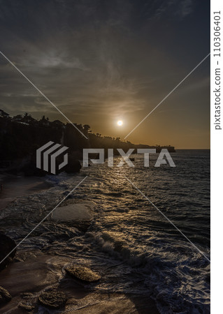 Kubu beach at sunset 110306401