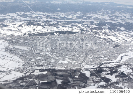 Aerial view of Kitami City in winter Kitami City urban area Kitami City, Hokkaido 110306490