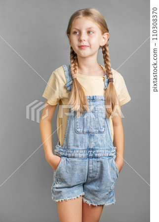 Portrait of a smiling little girl with blond  hair 110308370
