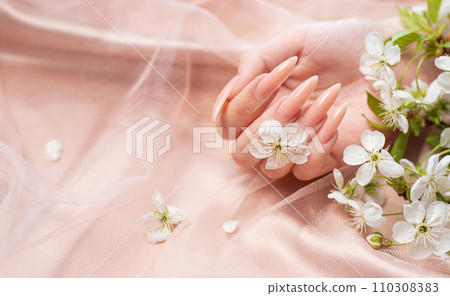 Elegant pastel pink natural manicure. Elegant pastel pink natural manicure. 110308383