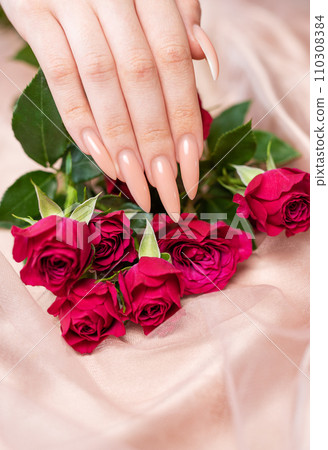 Elegant pastel pink natural manicure. Elegant pastel pink natural manicure. 110308384