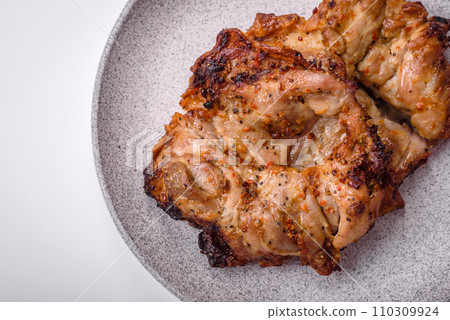 Delicious fresh crispy chicken grilled with salt, spices and herbs Delicious fresh crispy chicken grilled with salt, spices and herbs 110309924