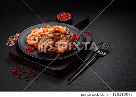 Delicious fresh crispy chicken grilled with salt, spices and herbs Delicious fresh crispy chicken grilled with salt, spices and herbs 110310072