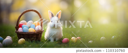 Easter bunny with a basket of eggs. 110310760