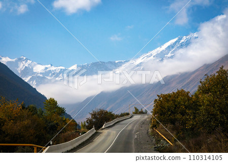 Winter mountain landscape with snow-capped peak Winter mountain landscape with snow-capped peak 110314105