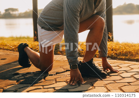 Athlete runner feet running on road, Jogging concept at outdoors. Man running for exercise..Athlete runner feet running on road, Jogging concept at outdoors. Man running for exercise. Athlete runner feet running on road, Jogging concept at outdoors. Man running for exercise..Athlete runner feet running on road, Jogging concept at outdoors. Man running for exercise. 110314175