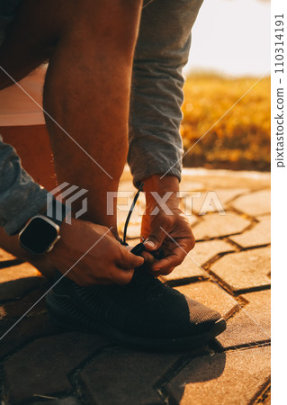 Athlete runner feet running on road, Jogging concept at outdoors. Man running for exercise..Athlete runner feet running on road, Jogging concept at outdoors. Man running for exercise. Athlete runner feet running on road, Jogging concept at outdoors. Man running for exercise..Athlete runner feet running on road, Jogging concept at outdoors. Man running for exercise. 110314191