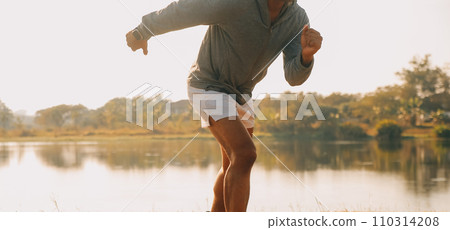 Athlete runner feet running on road, Jogging concept at outdoors. Man running for exercise..Athlete runner feet running on road, Jogging concept at outdoors. Man running for exercise. Athlete runner feet running on road, Jogging concept at outdoors. Man running for exercise..Athlete runner feet running on road, Jogging concept at outdoors. Man running for exercise. 110314208