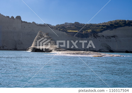 Island Corfu and Ionian sea from a boat Island Corfu and Ionian sea from a boat 110317504