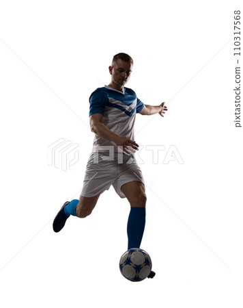 Football player kicks the soccer ball ready to the match Football player kicks the soccer ball ready to the match 110317568