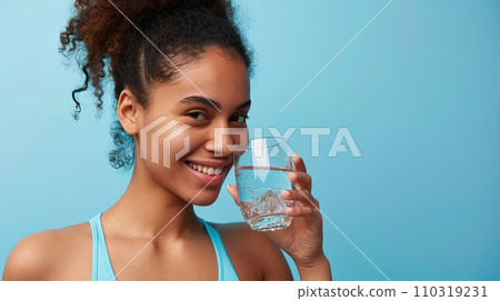 AI-generated content. Female athlete in sportswear drink fresh water from glass. Generative AI 110319231