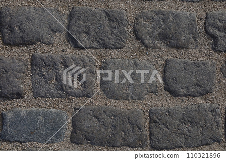 Textured paving brick wall background Textured paving brick wall background 110321896