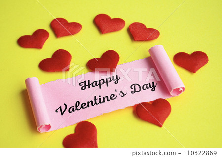 Happy Valentine's Day text on torn paper with text or ideas for Valentine's day heart shapes 110322869