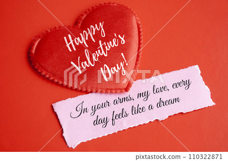 Happy Valentine's Days text on heart shape with love message on torn paper. Valentine's Day concept. 110322871