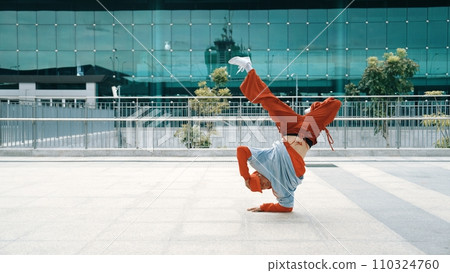 Skilled dancer moving energetic footstep while perform street dance. Sprightly. 110324760