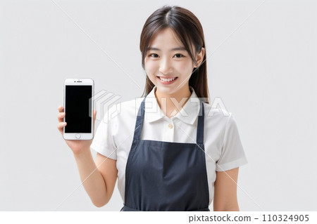 A beautiful (smiling) Japanese woman who is happy while operating a smartphone AI Generated 110324905