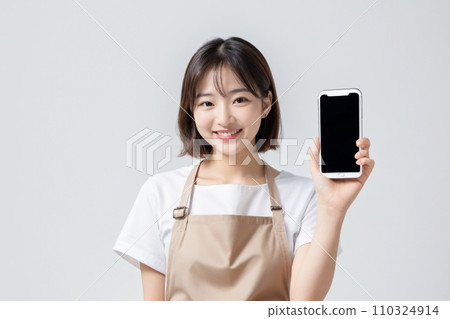 A beautiful (smiling) Japanese woman who is happy while operating a smartphone AI Generated A beautiful (smiling) Japanese woman who is happy while operating a smartphone AI Generated 110324914
