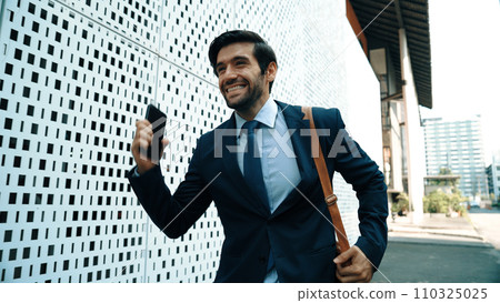 Happy smart business man celebrate for getting promotion or good news. Exultant 110325025
