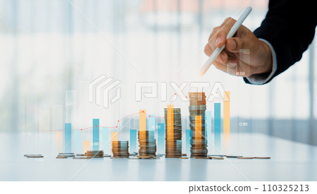 Coin stack with digital graphic indicator symbolize business investment. Shrewd 110325213