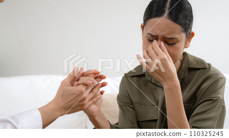 Supportive and comforting hands for empathy in vivancy therapy office 110325245