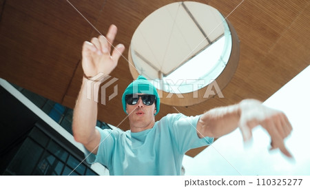 Caucasian handsome hipster looking at camera while pose cool posing. Endeavor. 110325277