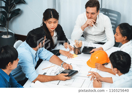 Diverse group of civil engineer and client working on architect. Prudent 110325640