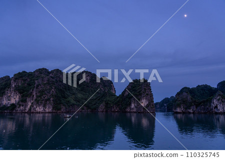 View of the moon from the deck of a cruise ship on a cruise in Ha Long Bay, Vietnam View of the moon from the deck of a cruise ship on a cruise in Ha Long Bay, Vietnam 110325745