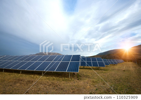 Solar power station. Solar panels, photovoltaics, alternative source of electricity - concept of sustainable and renewable sources. 110325909