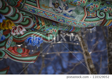 Roof of traditional Korean houses with icicles, Korean ancient architecture with icicles, snow, trees, and Korean-style houses Roof of traditional Korean houses with icicles, Korean ancient architecture with icicles, snow, trees, and Korean-style houses 110329052