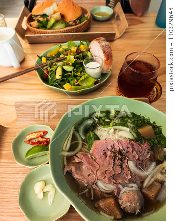 Delicious Vietnamese Beef Pho with Phat Quoc Bread 110329643