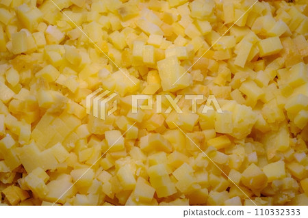 Boiled potatoes cut into small cubes. Making salads in large quantities Boiled potatoes cut into small cubes. Making salads in large quantities 110332333