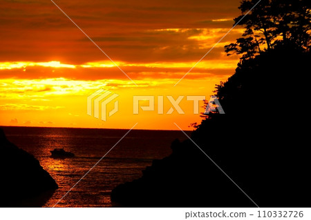 Sunset over the sea 110332726